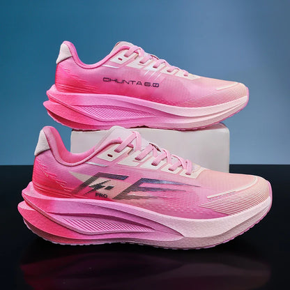 A pair of pink running shoes, with the top shoe resting on a white block above the bottom shoe. The shoes feature a vibrant pink gradient design, thick sculpted midsoles, and branding text 'CHUNTA 6.